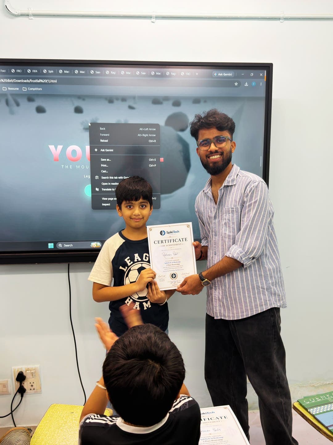 SpikiTech student receiving their AI Bootcamp certificate