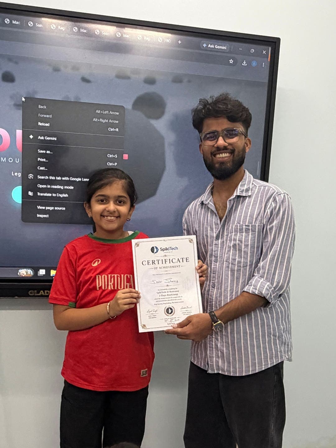 SpikiTech student receiving their AI Bootcamp certificate